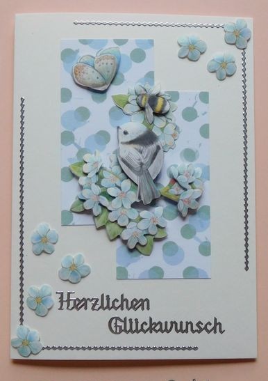 Glückwunschkarte mit Vögelchen und Blüten