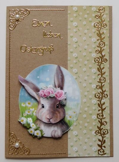 Karte mit Osterhase und Gänseblümchen