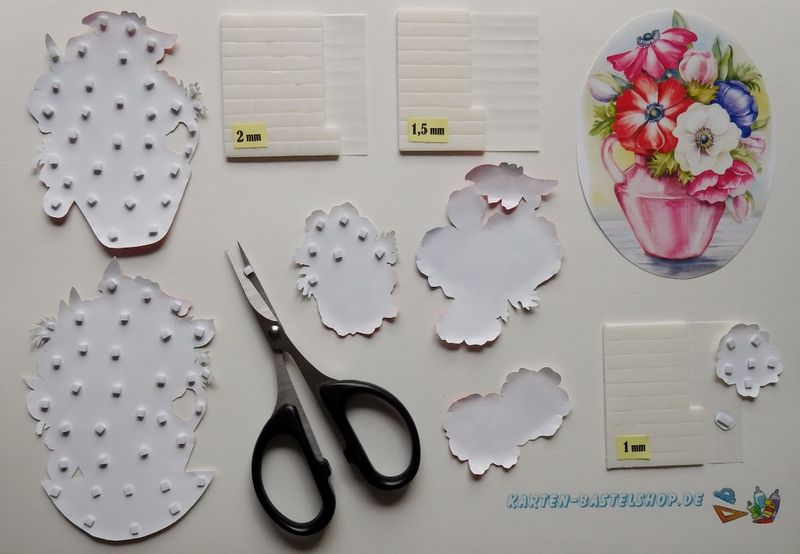 3D-Klebepads auf der Rückseite der Bildteile anbringen