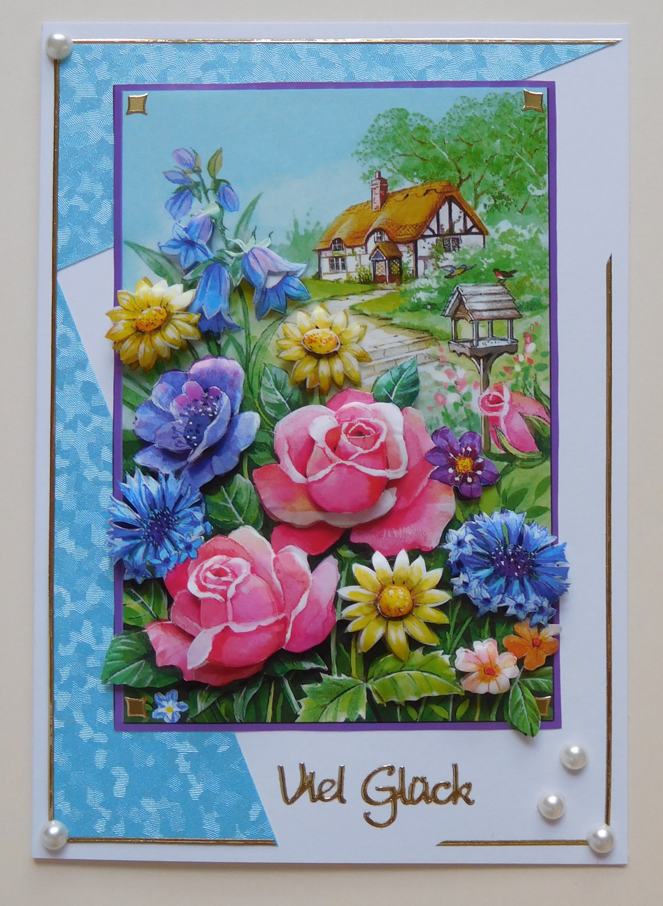 Glückwunschkarte mit Landhausmotiv und hellblauem Flitterpapier