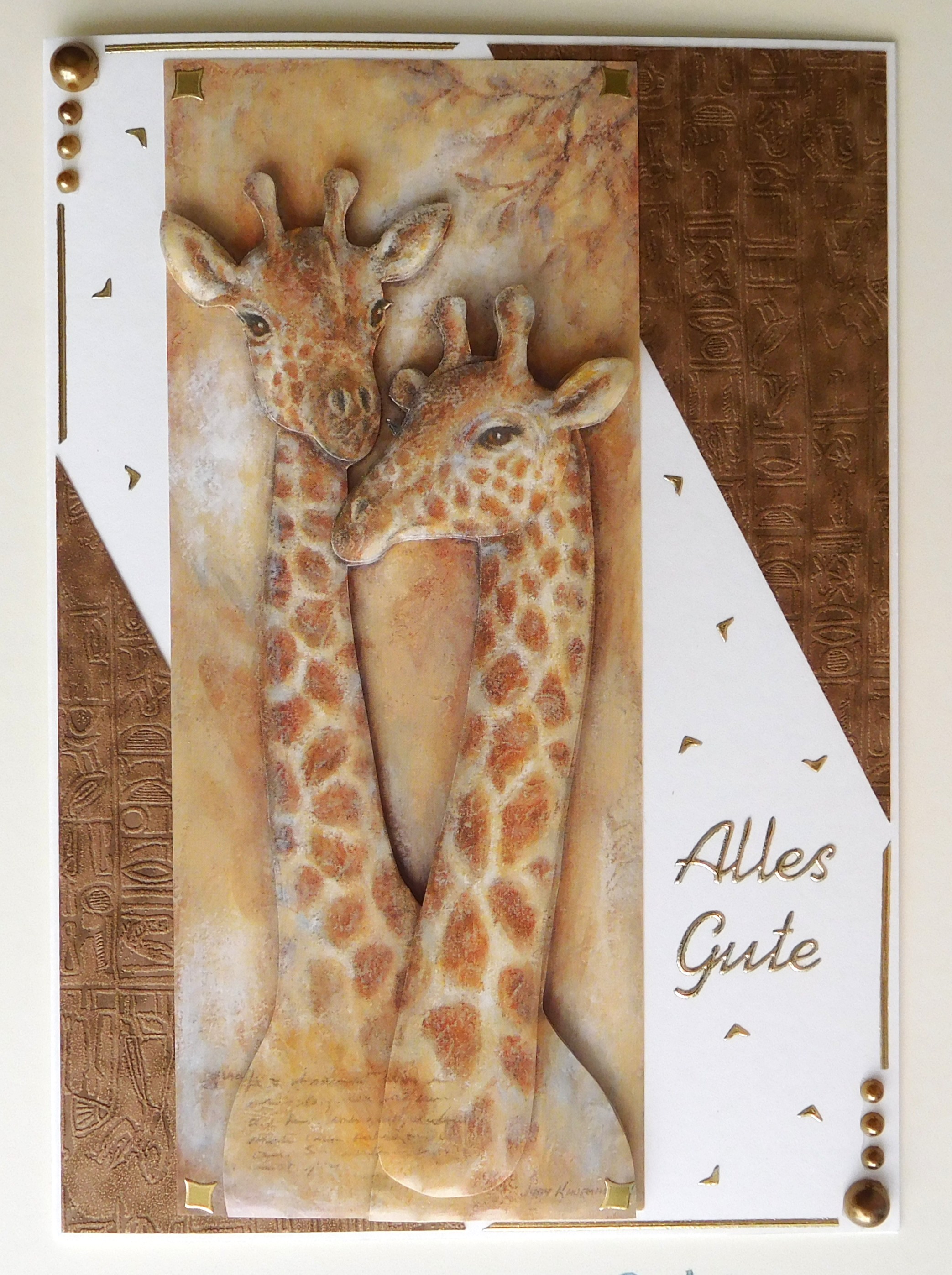 Afrika-Karte mit zwei Giraffen, braunem Hieroglyphenpapier und dem Gruß Alles Gute
