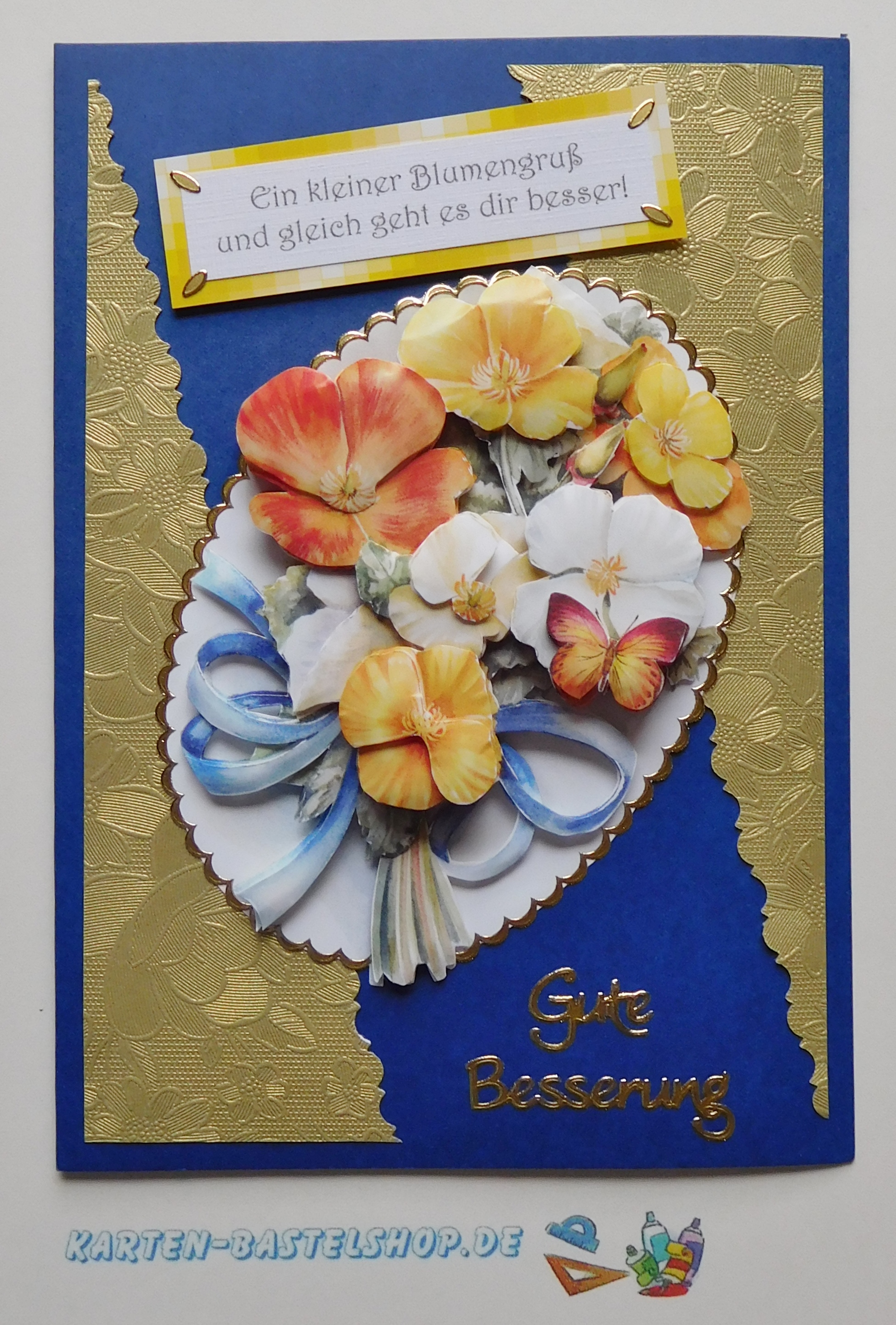 Genesungskarte mit blauem Hintergrund, goldenem Papier und ovalem Blumenmotiv